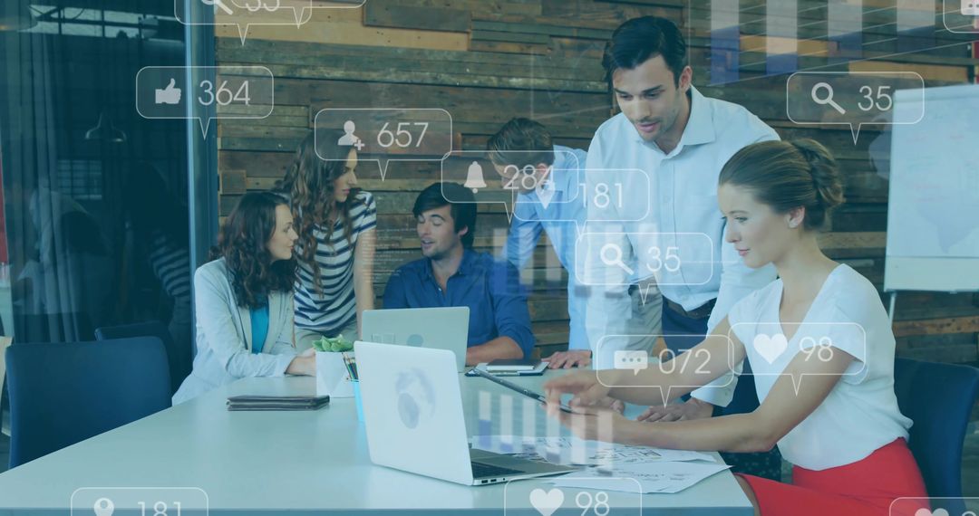 Digital Marketing Team Analyzing Social Media Trends in Modern Office