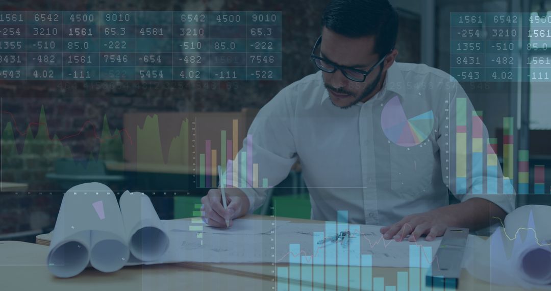 Businessman Analyzing Graphs and Data Charts in Office