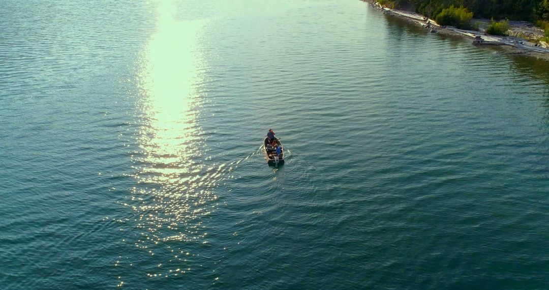 Serene Lake Canoeing at Sunset - Free Images, Stock Photos and Pictures on Pikwizard.com