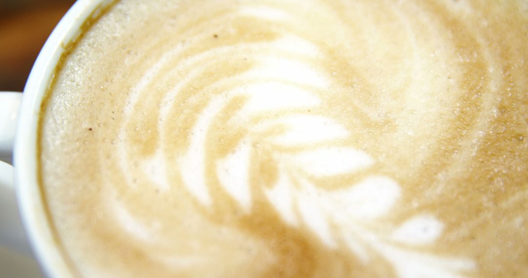 Creamy Latte Art with Elegant Swirl in Cup - Free Images, Stock Photos and Pictures on Pikwizard.com