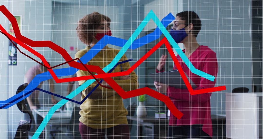 Business Colleagues Discussing Trends with Graph Overlay During Pandemic