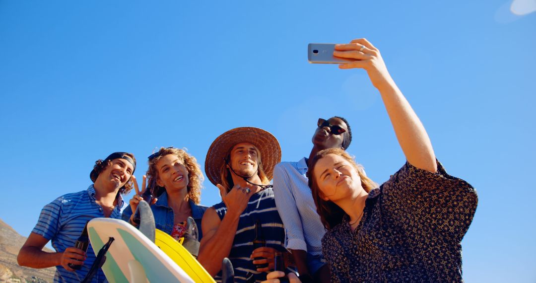 Diverse Group of Friends Taking Selfie on Sunny Beach - Free Images, Stock Photos and Pictures on Pikwizard.com