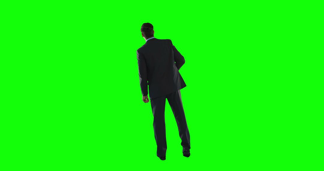 Business Man in Suit Standing with Green Screen Background - Free Images, Stock Photos and Pictures on Pikwizard.com