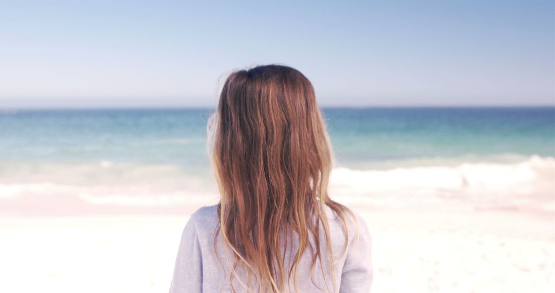 Girl With Long Hair Admiring Serene Beach Horizon - Free Images, Stock Photos and Pictures on Pikwizard.com