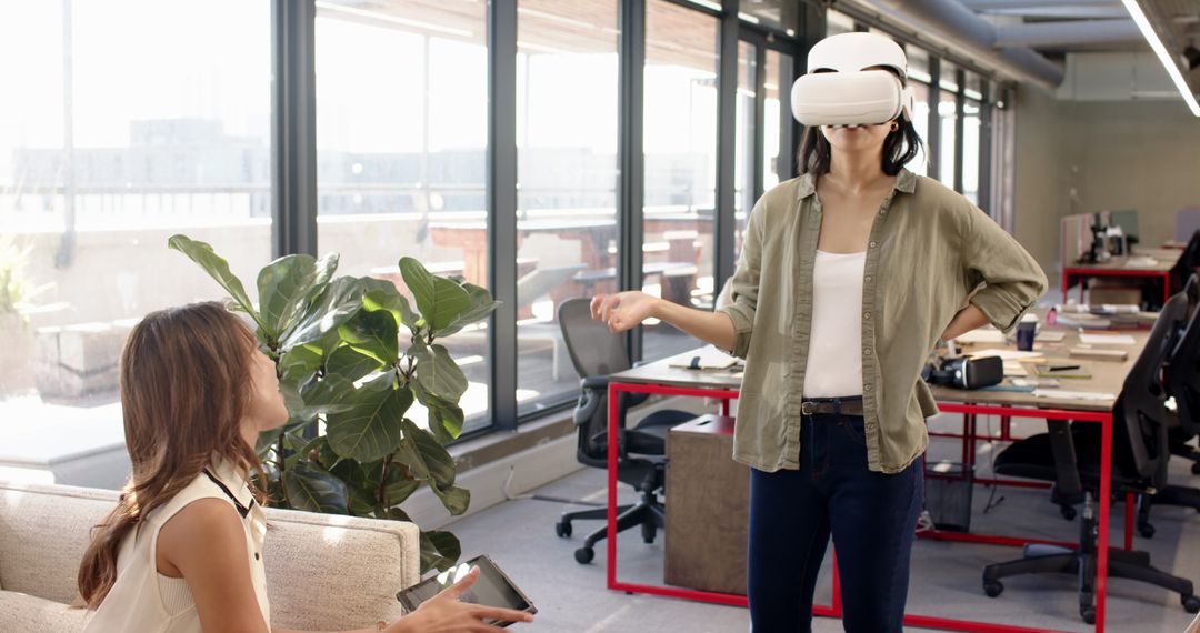 Female Colleagues Exploring Virtual Reality in Modern Office