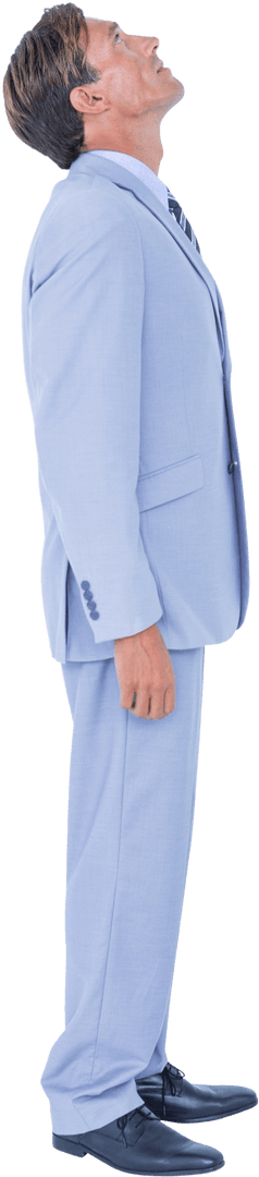 Focused Businessman in Suit Looking Up on Transparent Background