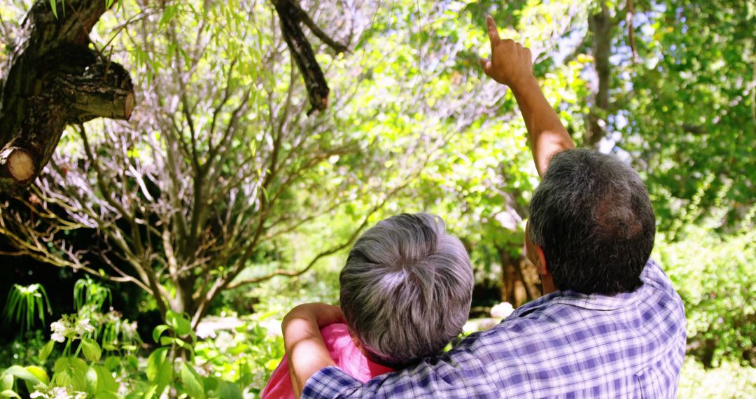 Senior Couple Enjoying Nature in Lush Garden Embracing Serenity