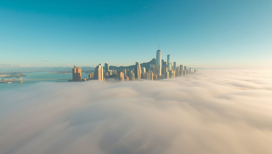 Futuristic Skyscrapers Emerging Through Dense Morning Fog