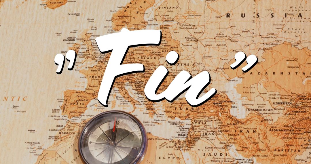 Compass on Vintage Map with 'Fin' Text Overlay