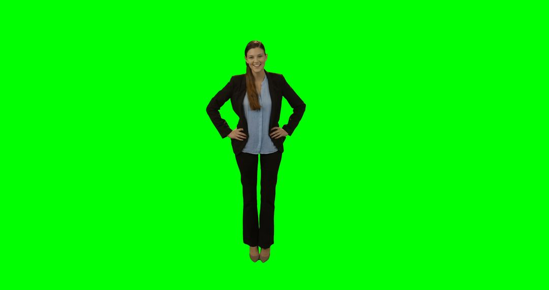 Confident Businesswoman With Hands on Hips on Green Screen