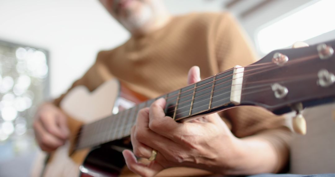 Man Playing Acoustic Guitar Close-Up - Free Images, Stock Photos and Pictures on Pikwizard.com