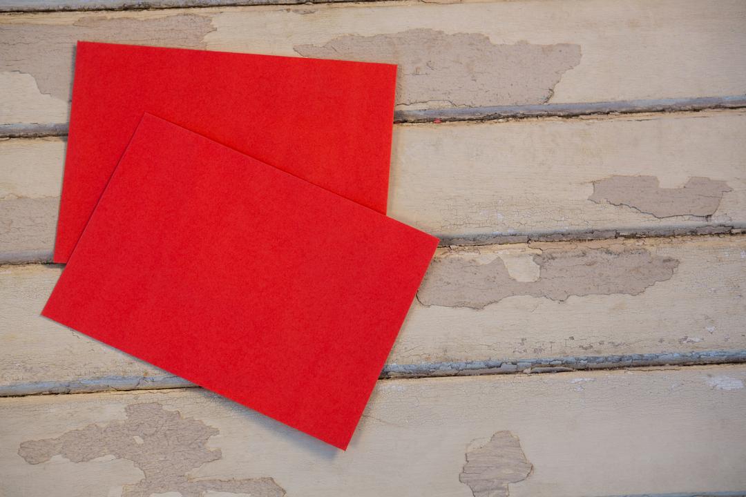 Red envelopes on wooden plank - Free Images, Stock Photos and Pictures on Pikwizard.com