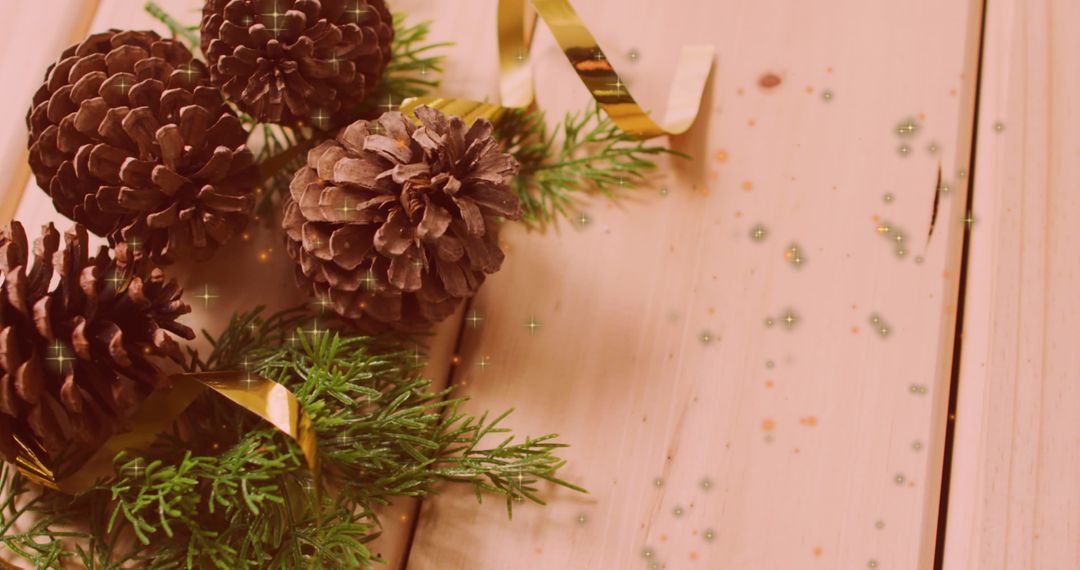 Festive Pine Cones and Glowing Lights on Wooden Surface