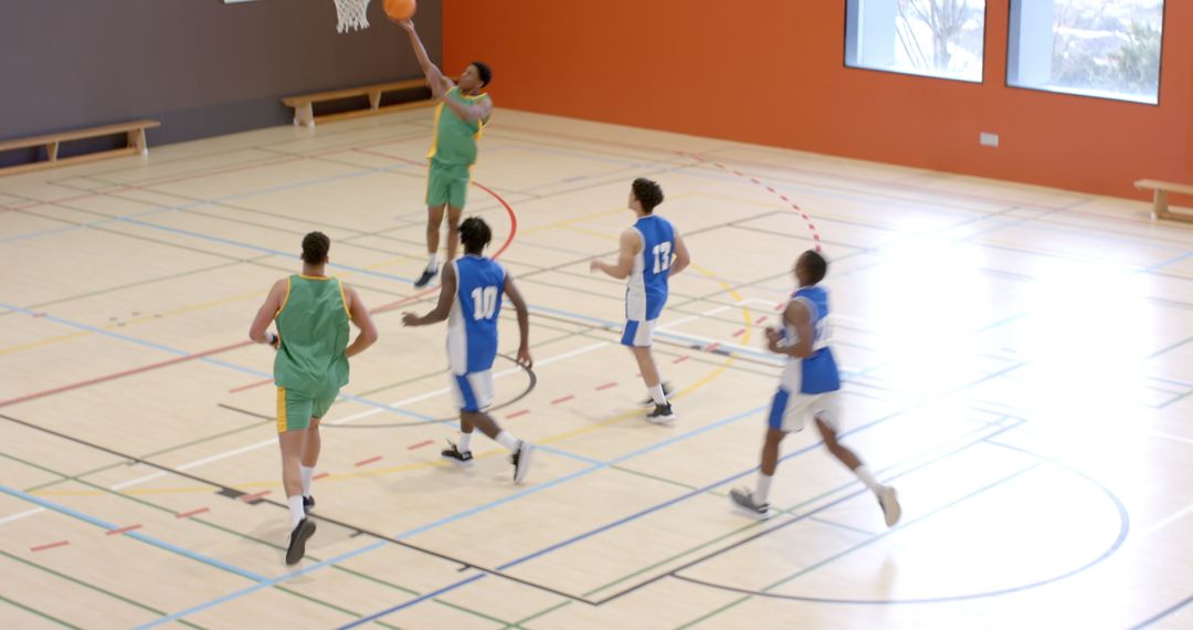 Basketball Game Player Shooting Ball in Gym Arena