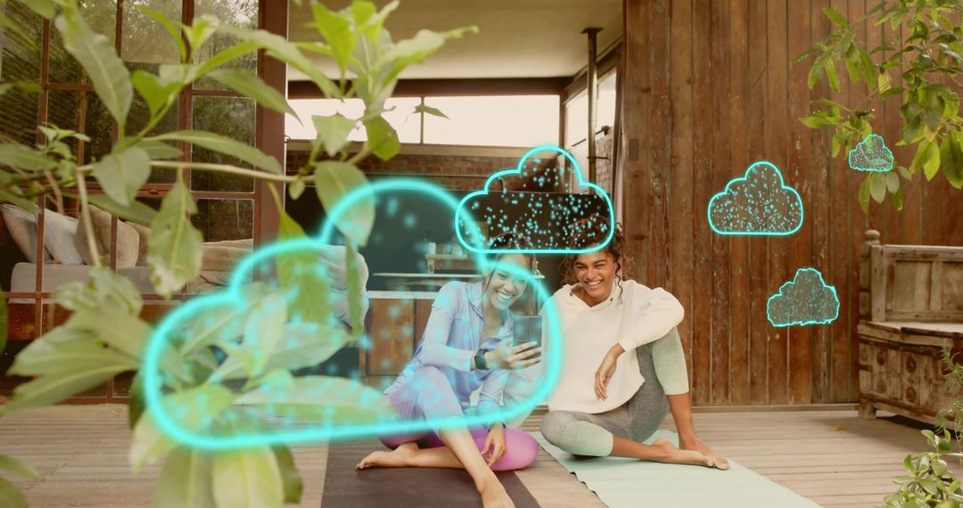 Women Practicing Yoga Outdoors Using Smartphone Displaying Augmented Reality Cloud Holograms