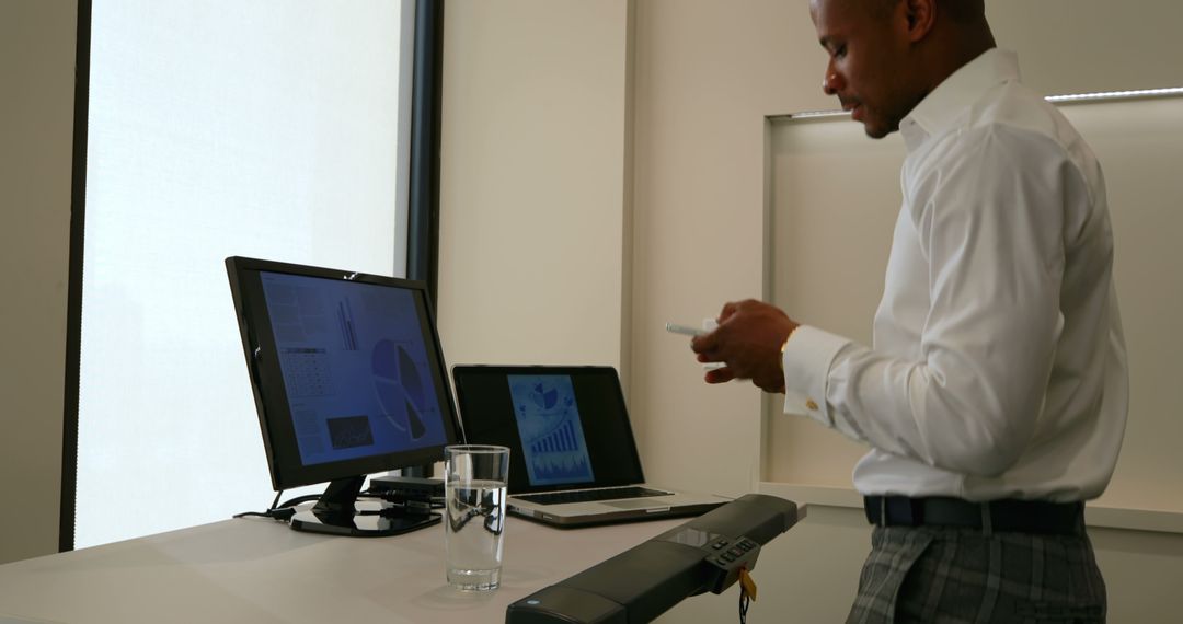 Businessman Multitasking on Treadmill Desk in Office Environment