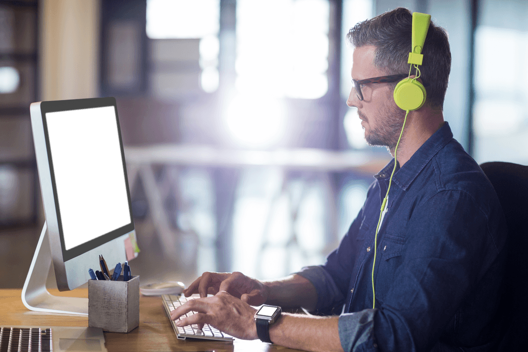 Focused Man with Headphones Adjusting Transparent Display Office