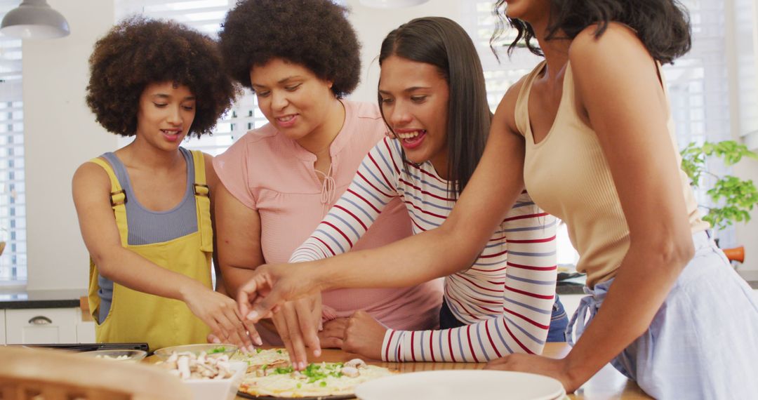 Diverse Group of Women Preparing Meal in Modern Kitchen - Free Images, Stock Photos and Pictures on Pikwizard.com