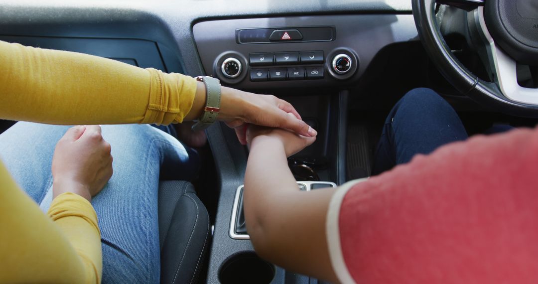 Sisters Bonding During Driving Lesson in Car Interior