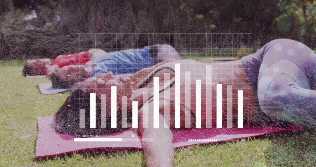 Group stretching class practicing supine relaxation on grass with fitness data overlay