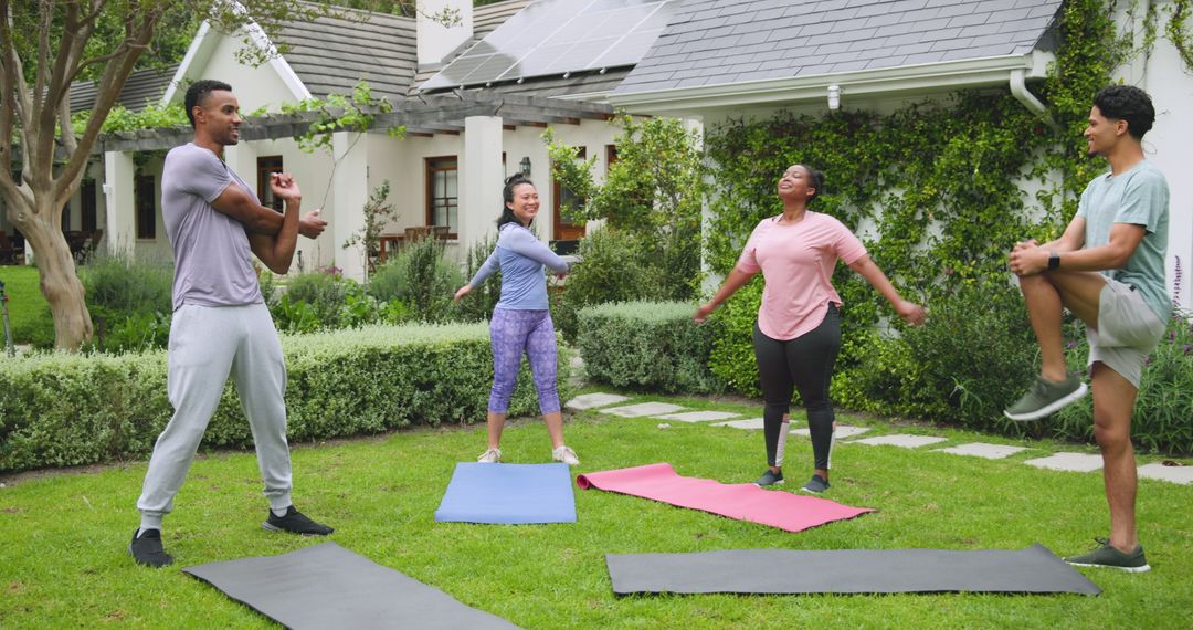 Diverse Group Enjoying Outdoor Stretching on Front Lawn