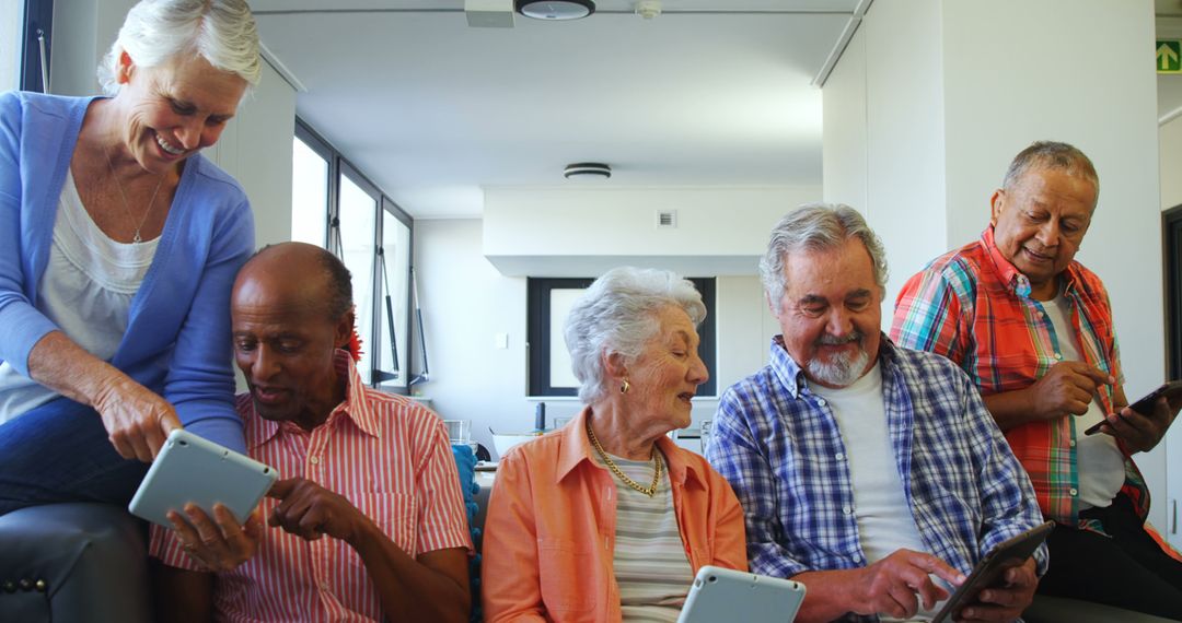Happy Senior Individuals Using Tablets for Digital Connection