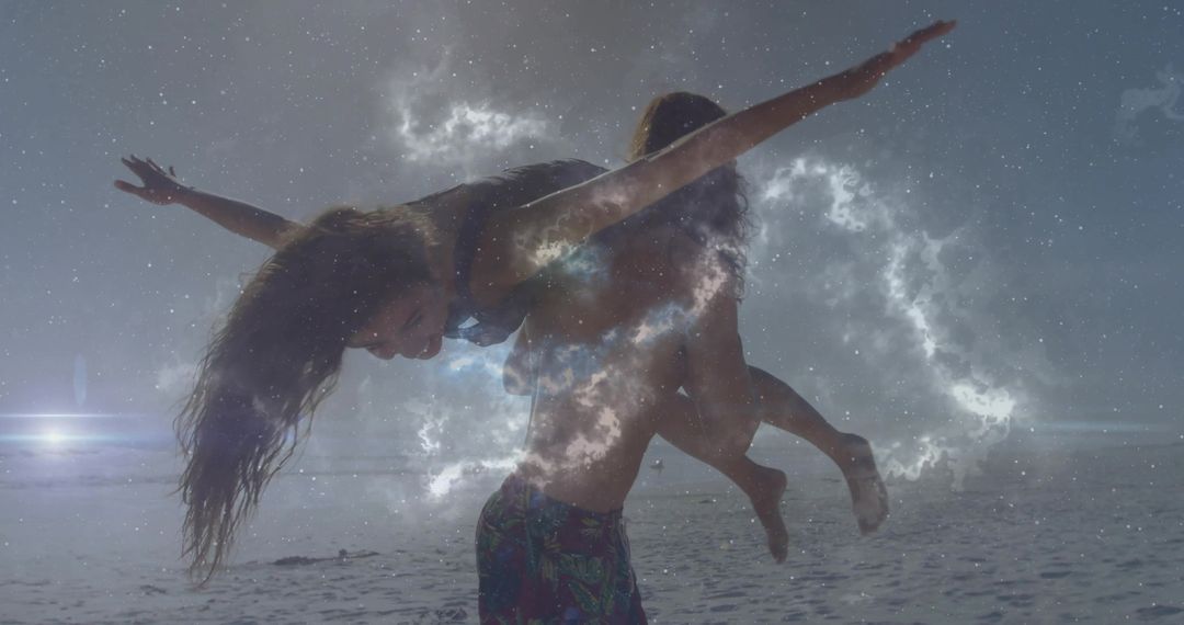 Couple playing on starlit beach carrying partner on shoulders with cosmic double-exposure