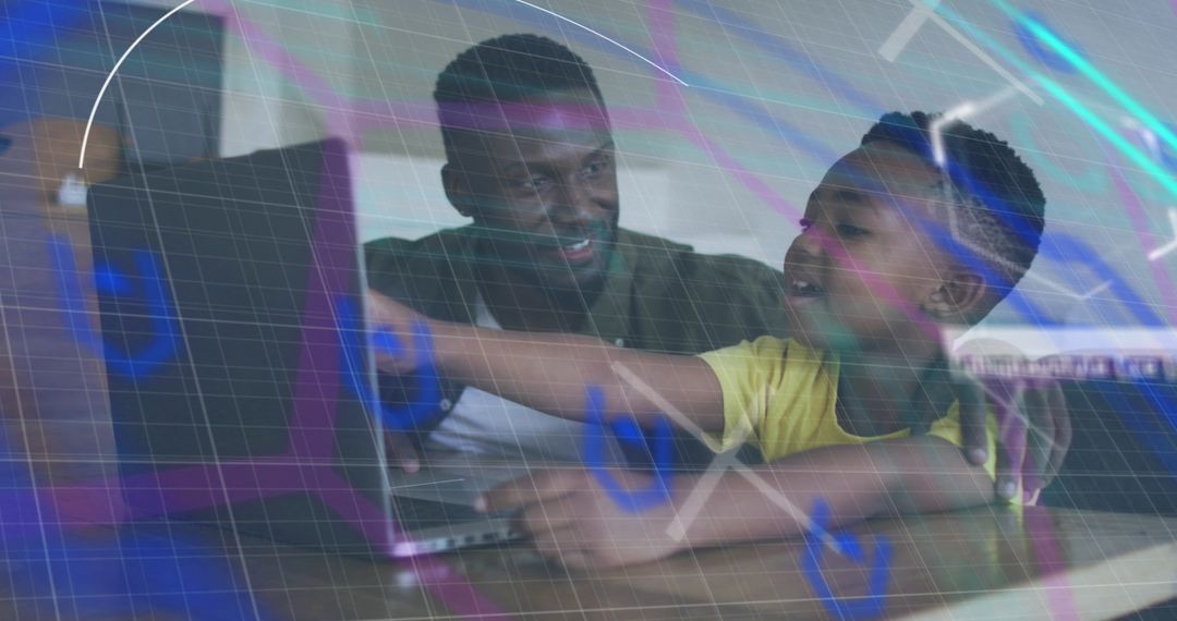 Father and Son Learning Together on Laptop at Home