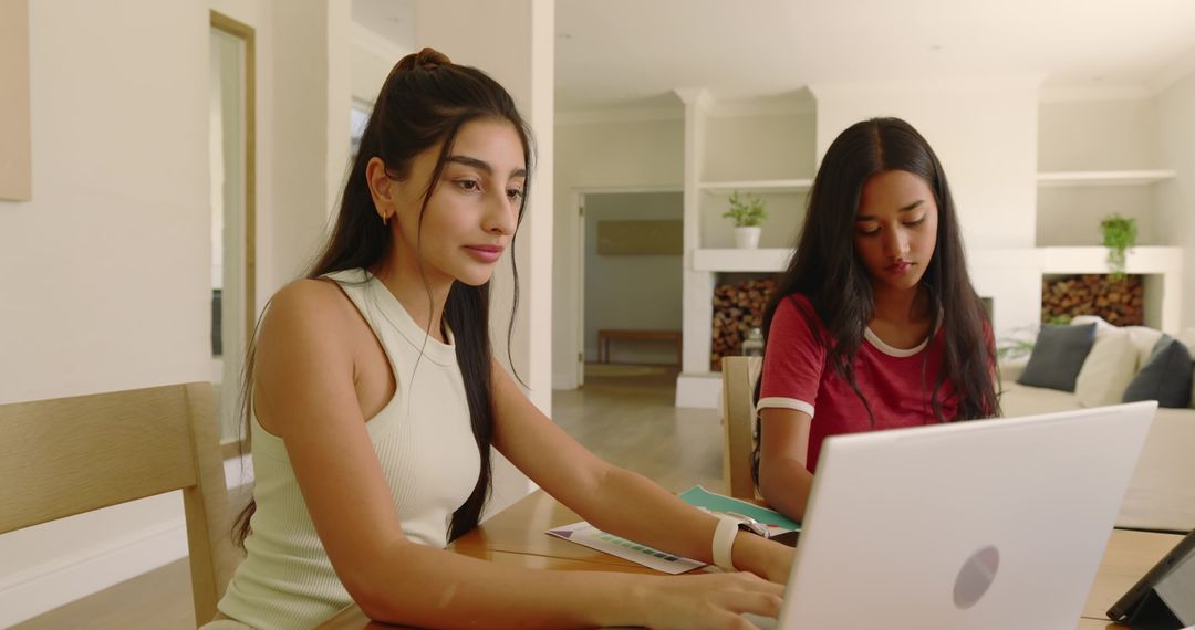 Diverse Friends Working Together at Cozy Home Workspace