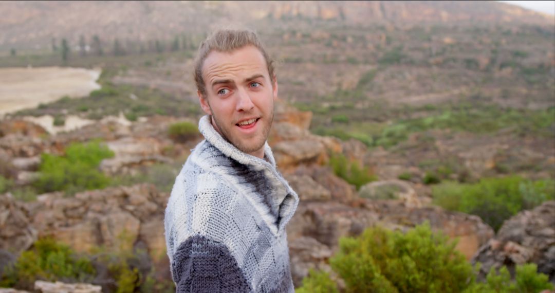 Smiling Climbers Enjoying Serene Mountain View