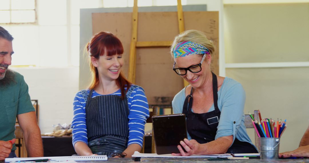 Happy Adults Engaged in Creative Art Class Collaboration