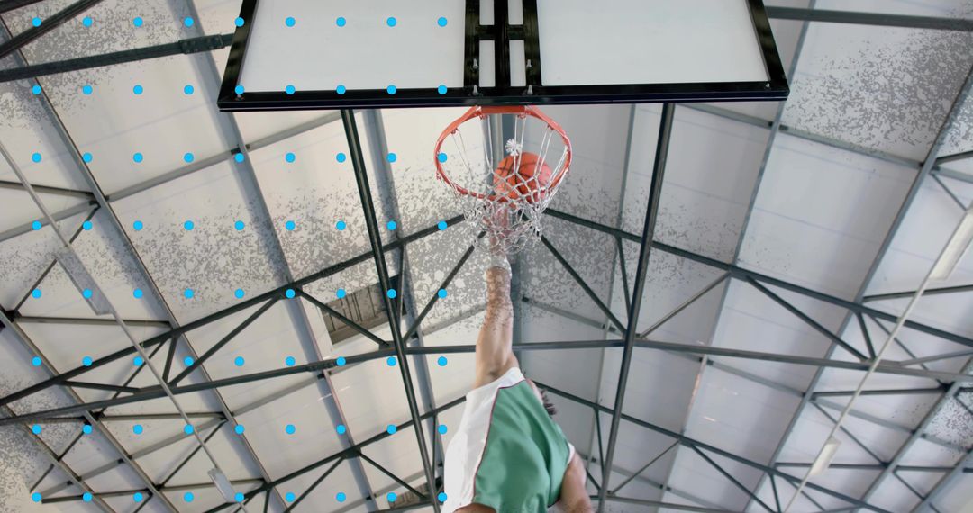 Basketball Player Dunking Ball in Gymnasium with Dynamic Motion