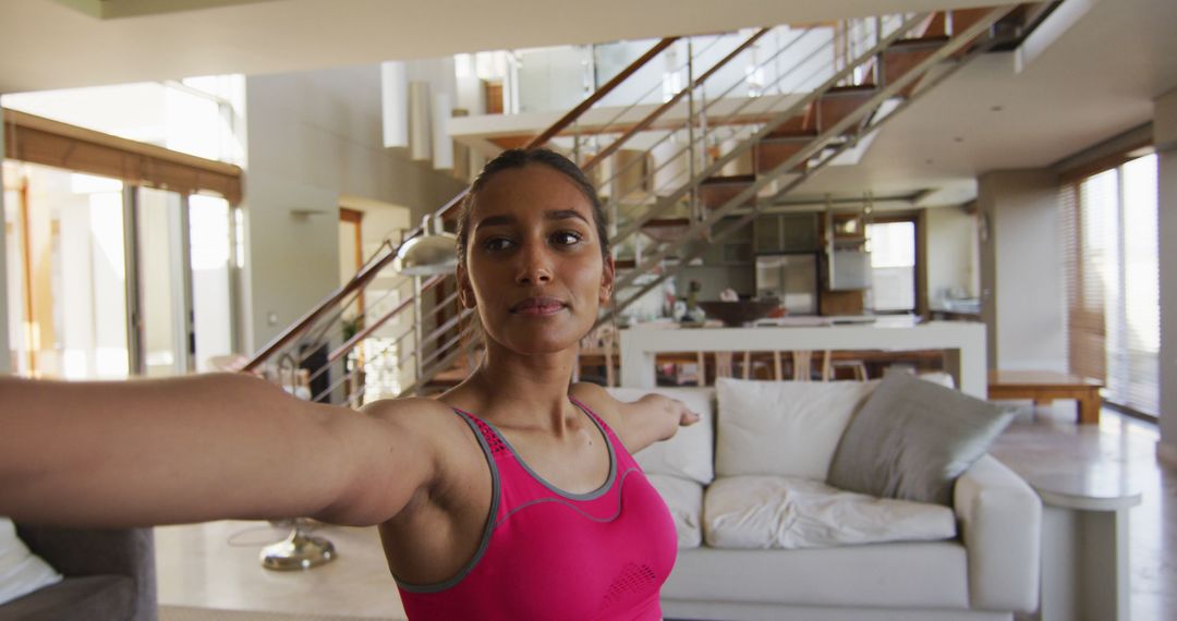 Woman Practicing Yoga in Living Room with Modern Interior - Free Images, Stock Photos and Pictures on Pikwizard.com