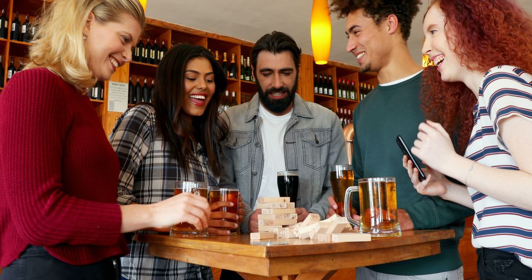 Diverse Friends Playing a Social Game at a Bar with Drinks