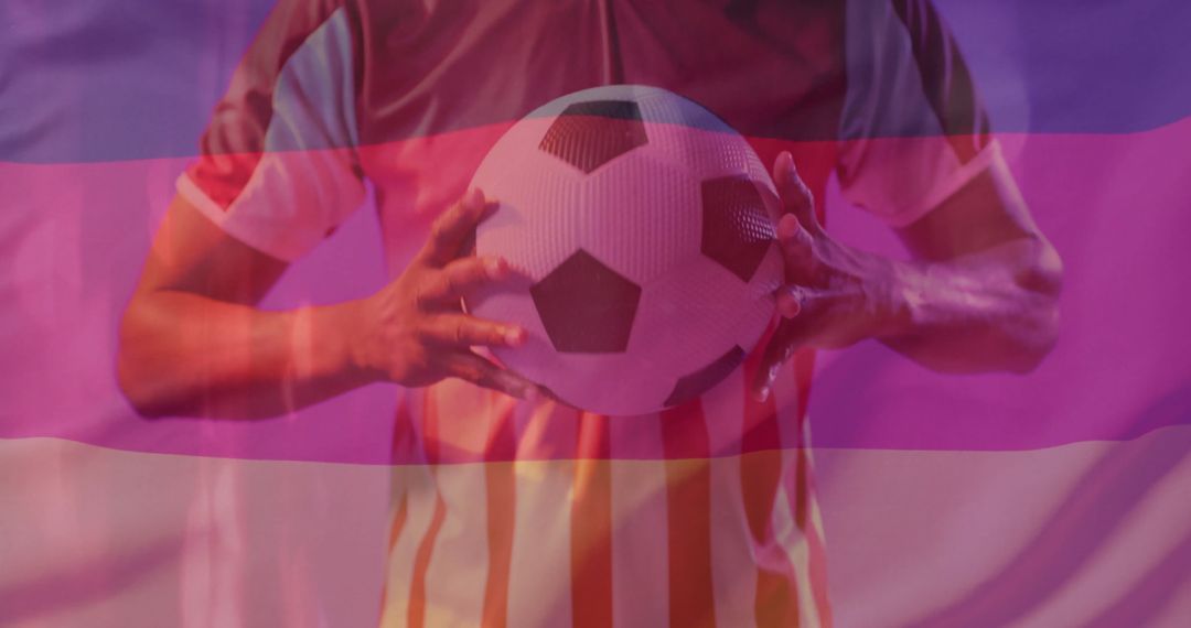 Football Player Holding Ball with Superimposed Flag of Germany