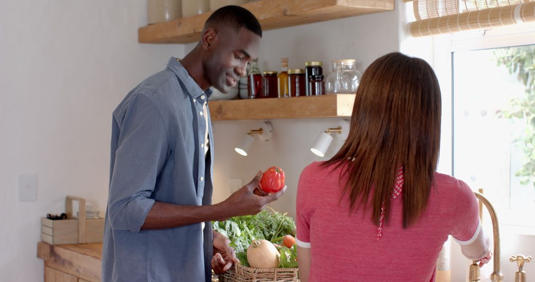 Couple Preparing Meal in Rustic Kitchen with Fresh Vegetables