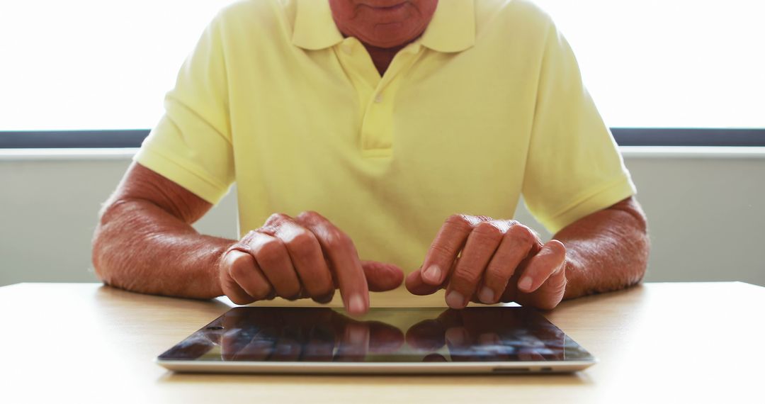 Senior Man Using Tablet for Communication at Home - Free Images, Stock Photos and Pictures on Pikwizard.com