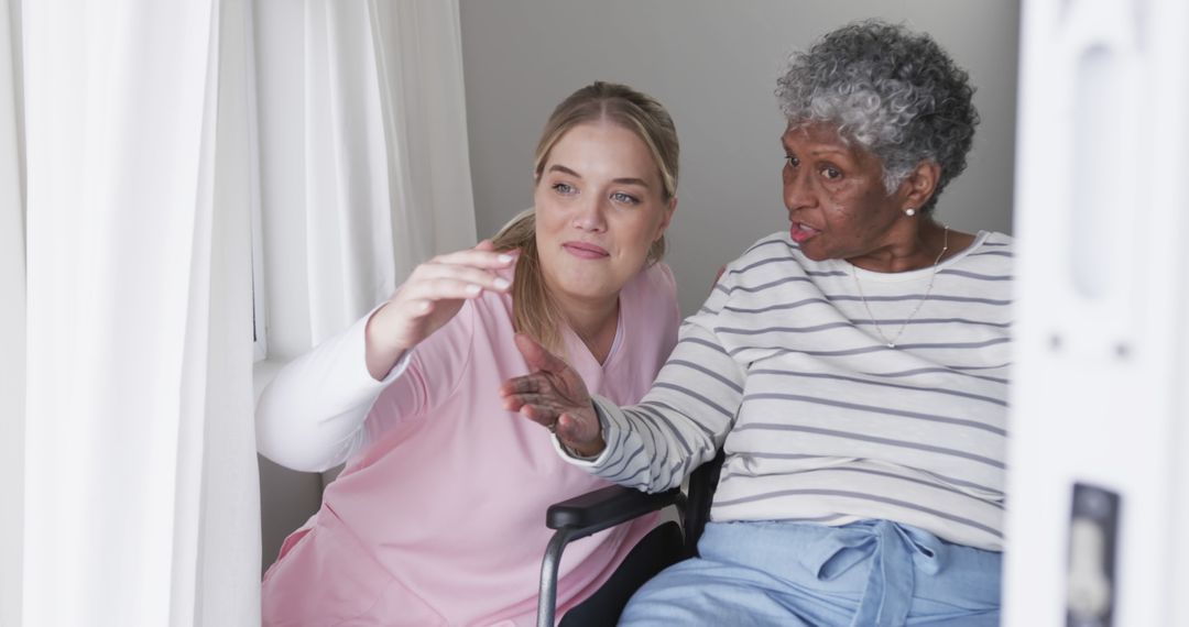 Caring Nurse Assisting Elderly Woman in Wheelchair at Home - Free Images, Stock Photos and Pictures on Pikwizard.com