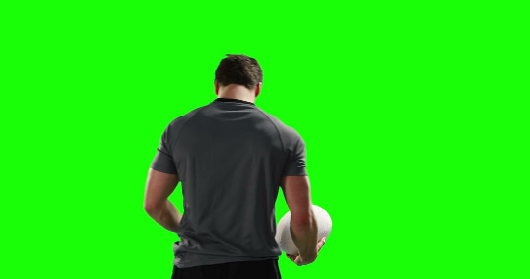 Athlete Holding Rugby Ball Rear View on Green Screen - Free Images, Stock Photos and Pictures on Pikwizard.com