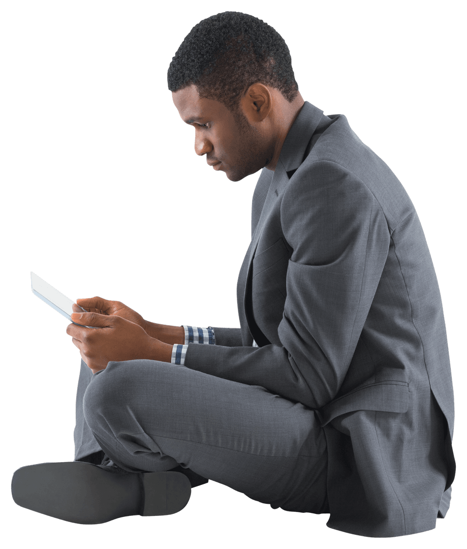 Business Professional Sitting Seamlessly Holding Tablet