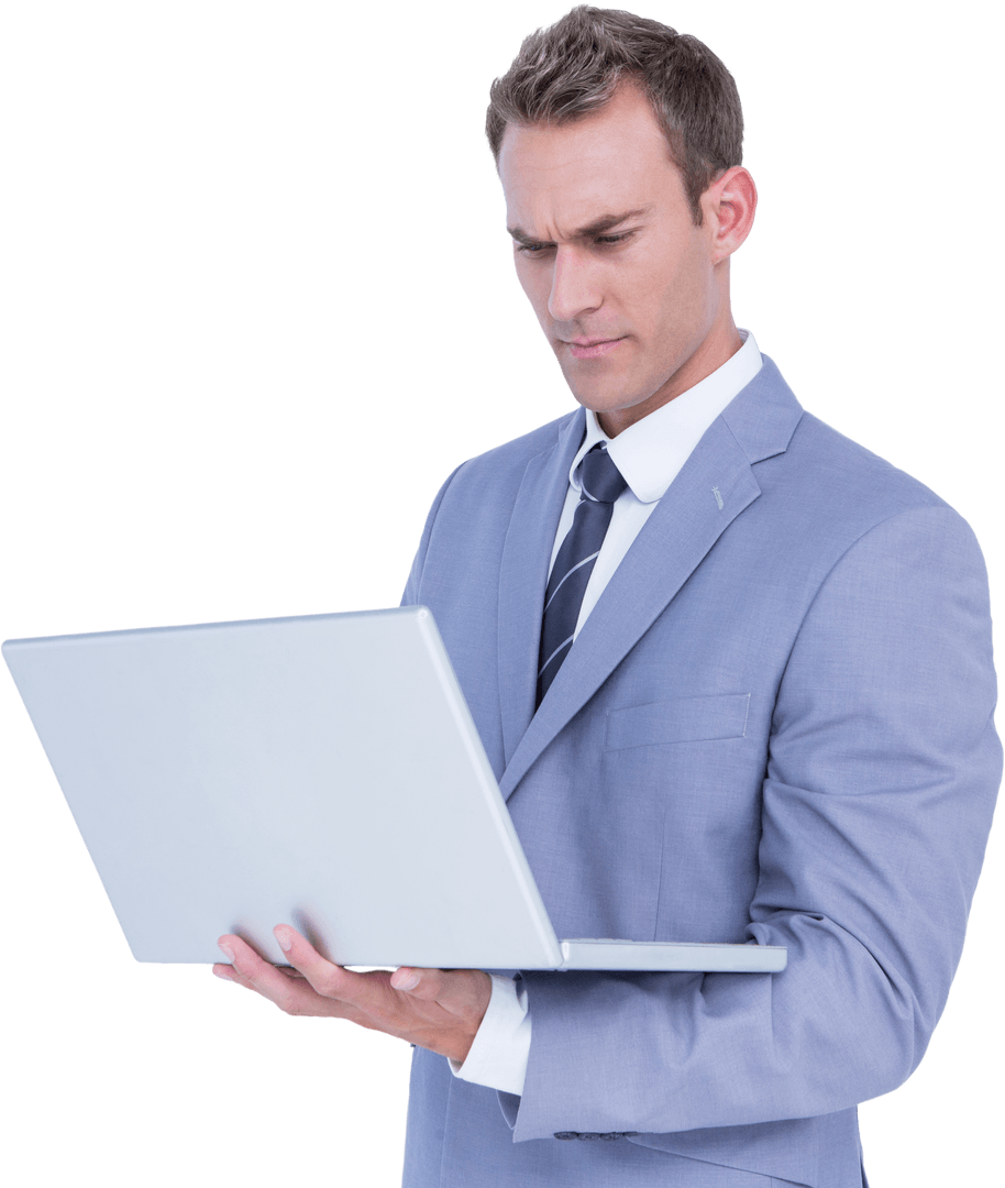 Focused Businessman Using Laptop Demonstrating Efficiency