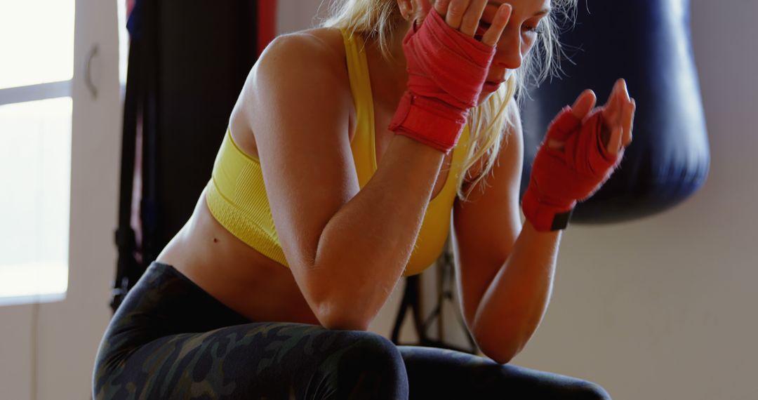 Female Boxer Taking a Break After Intense Training Session - Free Images, Stock Photos and Pictures on Pikwizard.com