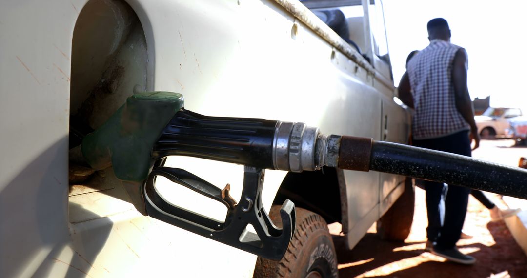 Close-Up of Vehicle Fueling at Gas Station in Rural Area - Free Images, Stock Photos and Pictures on Pikwizard.com