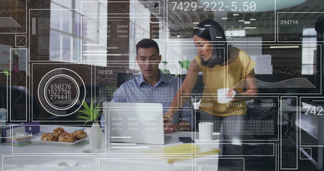 Innovative Team Analyzing Data with Digital Interface in Office