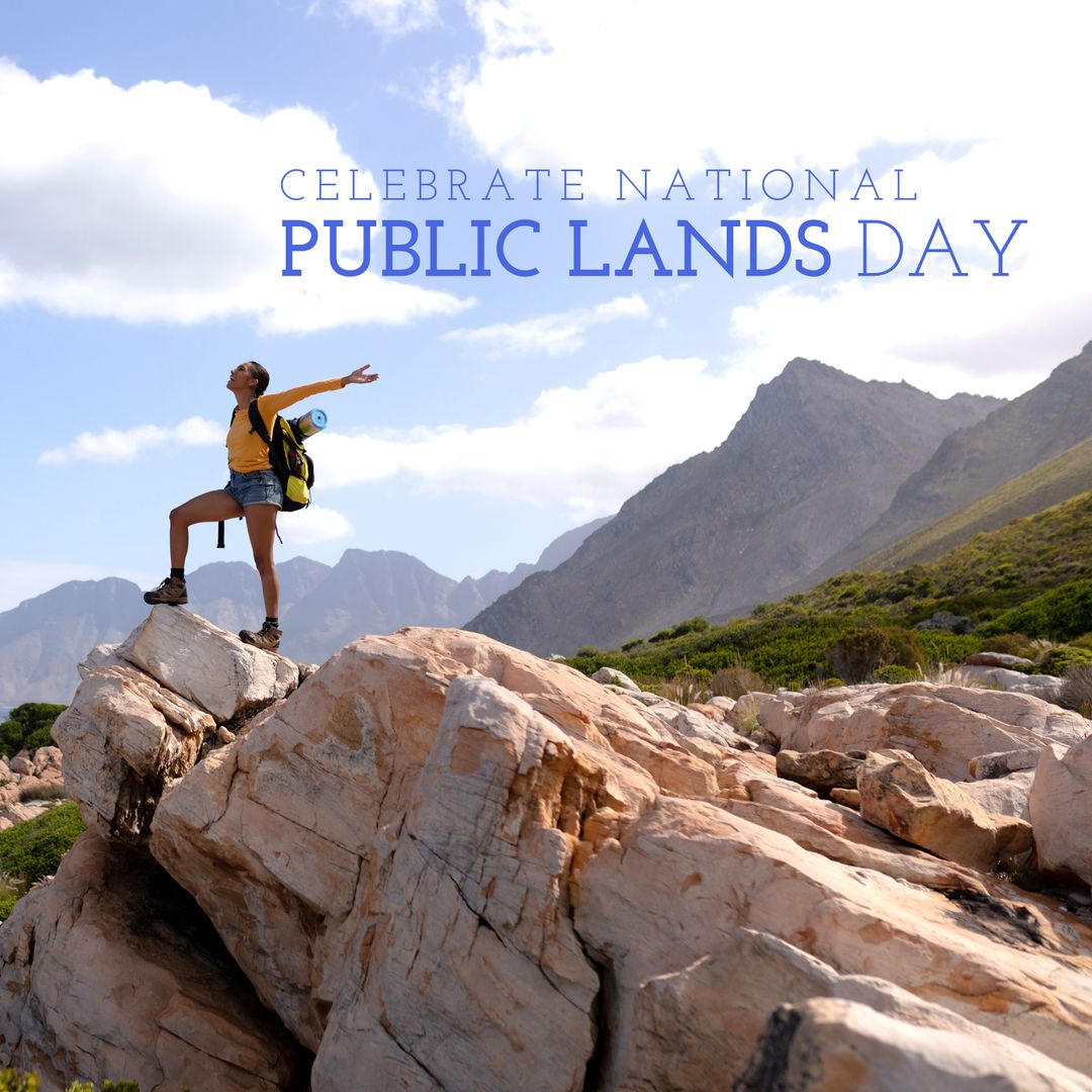 Inspirational Hiker Celebrating Nature on Mountain Peak, National Public Lands Day