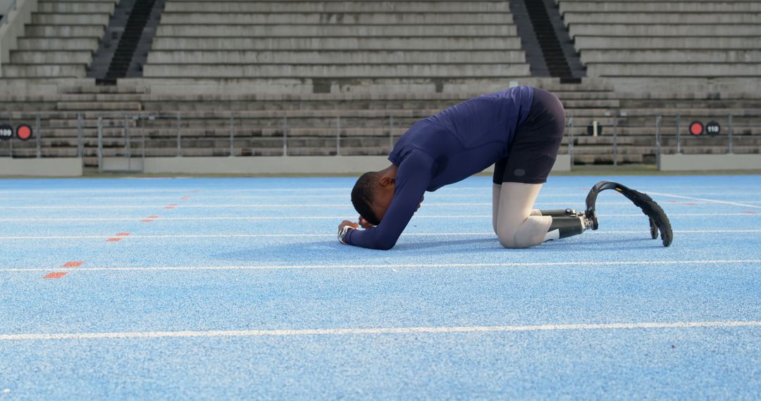 Determined Runner with Prosthetic Leg on Track Recovering - Free Images, Stock Photos and Pictures on Pikwizard.com