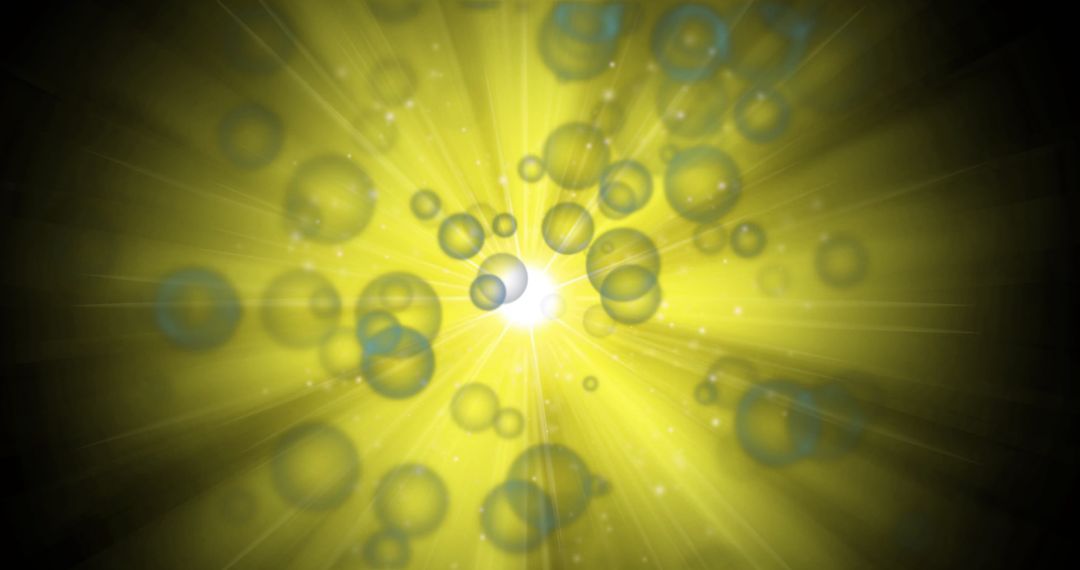 Abstract Yellow Light with Floating Bubbles on Black Background