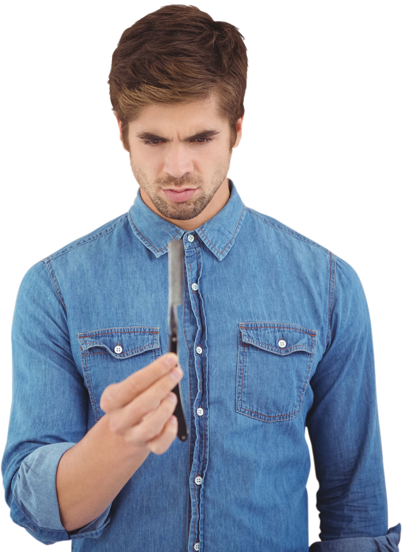 Man Anxiously Examining Transparent Straight Razor in Hands - Download Free Stock Images Pikwizard.com