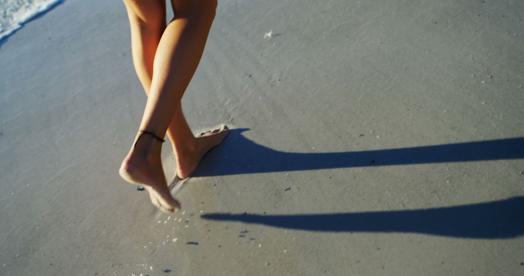 Woman Walking on Beach Sand with Anklet in Summer - Free Images, Stock Photos and Pictures on Pikwizard.com