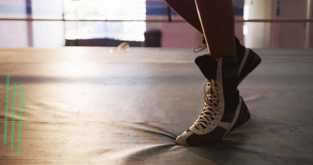 Athlete in Boxing Shoes Performing Footwork In Ring